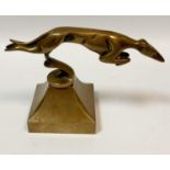 Automobilia - an Art Deco bronze car mascot as a leaping flying greyhound, shaped square base,