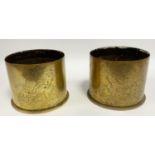 Trench Art - a pair of WWI period German shell case vases, each embossed with George and the Dragon,
