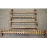 An oak plate rack, carved with eagle and lion masks, 67cm high, 73cm wide, c.1870; a galleried plate