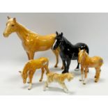 Beswick horses - Dales pony, black gloss; others, Palomino stallion, foal and foal grazing; a