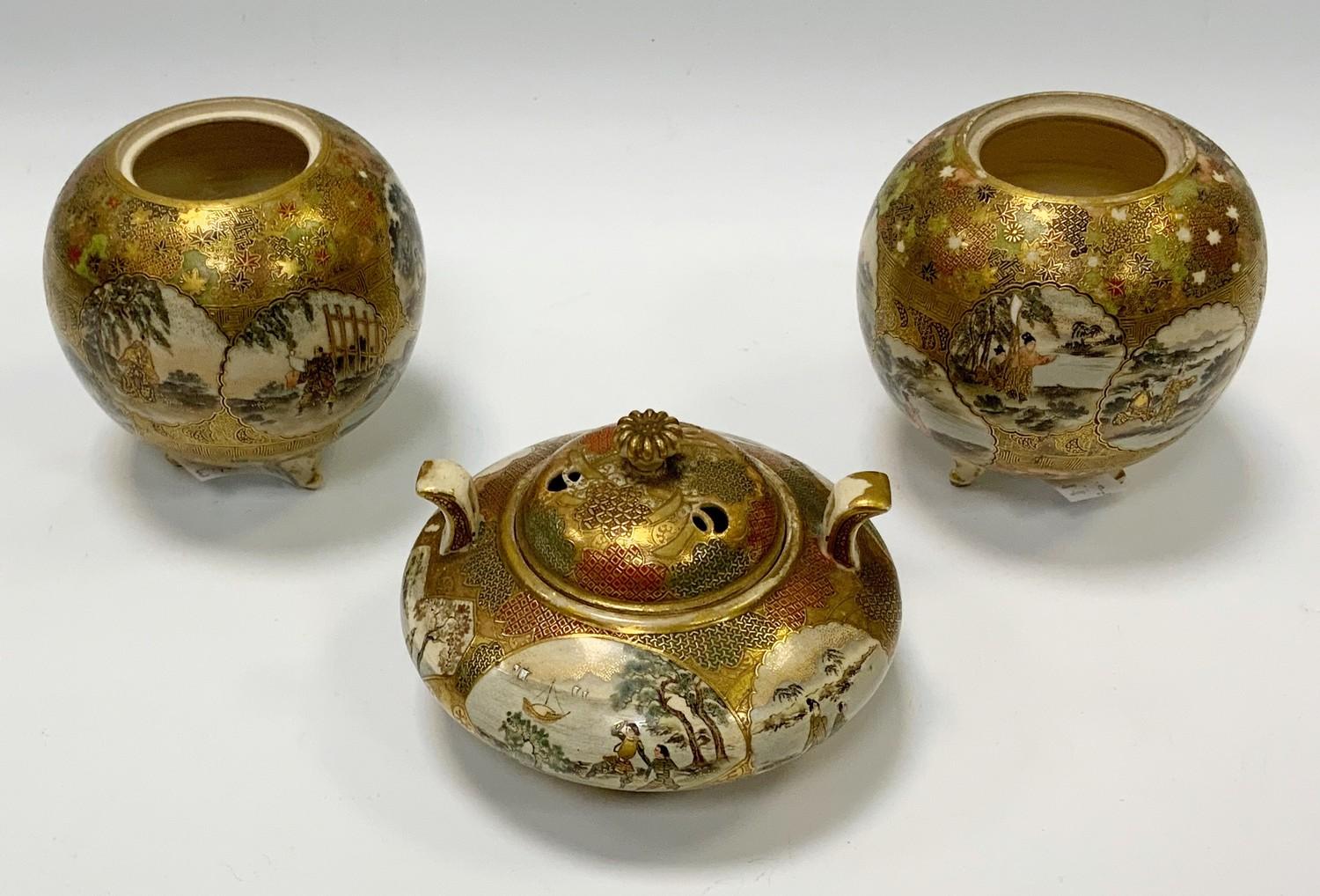 A pair of Japanese Satsuma pottery globular vases, each decorated with traditional figure panels