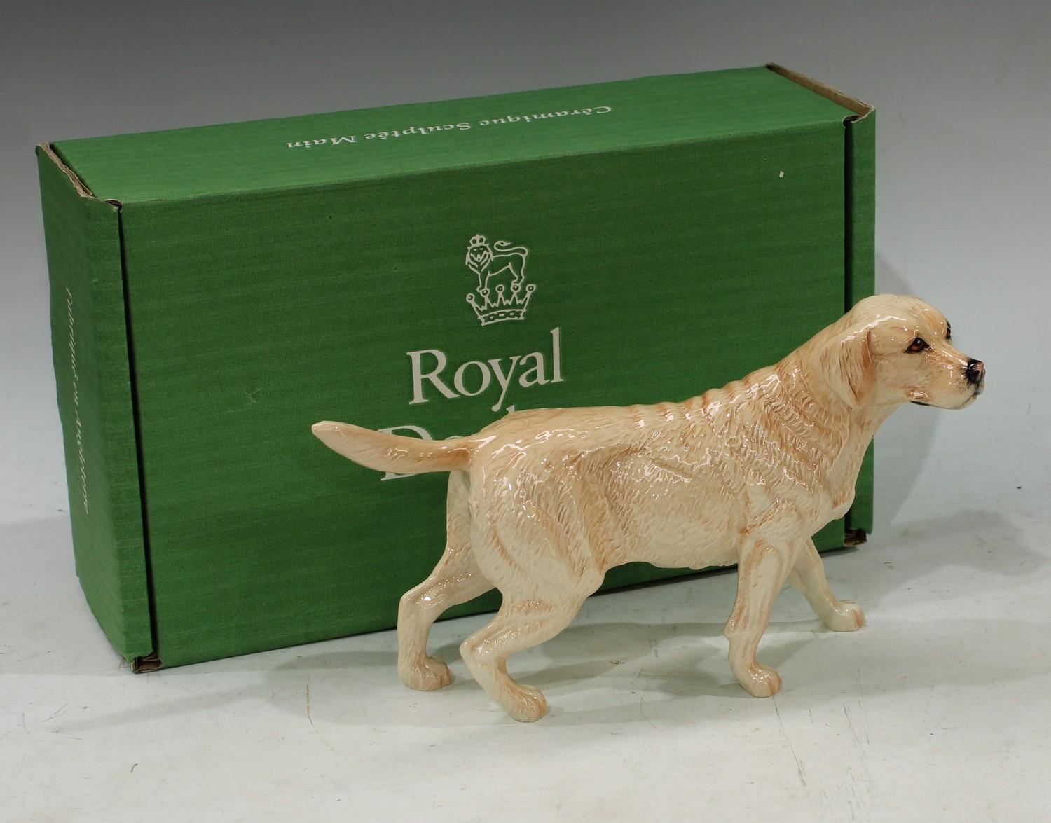 A Royal Doulton model of a Golden Labrador, boxed