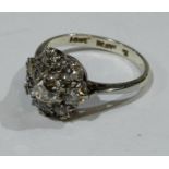An 18ct gold diamond cluster flower head ring, 3g