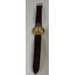 Longines - a 1950s gentleman's 9ct gold wristwatch, two tone dial, Arabic numerals and arrow baton