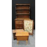 An oak dresser, two drawers over two panelled cupboard doors to base, 178cm high, 94cm wide; a