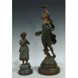 A French painted spelter model, titled Moisson, raised circular base, 47cm high; a French painted