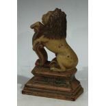 A polychrome painted cast iron door stop, as a rampant lion