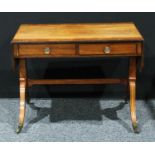 A Regency mahogany sofa table, reeded crossbanded top above a pair of frieze drawers, sabre legs,