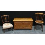 An oak blanket chest, 54cm high, 97cm wide; an Edwardian sheraton revival bedroom chair etc (3)