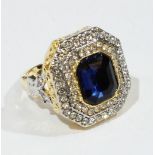 A yellow metal blue Art Deco style dress ring (size N)