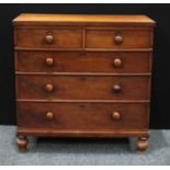 A Victorian mahogany chest of drawers, slightly oversailing rectangular top above two short and