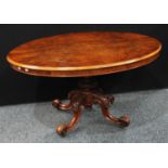 A Victorian walnut oval breakfast/centre table, moulded quarter-veneered tilting top, baluster