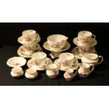 A Royal Crown Derby Posies pattern part tea set, milk and sugar, graduated cream jugs, comport, etc