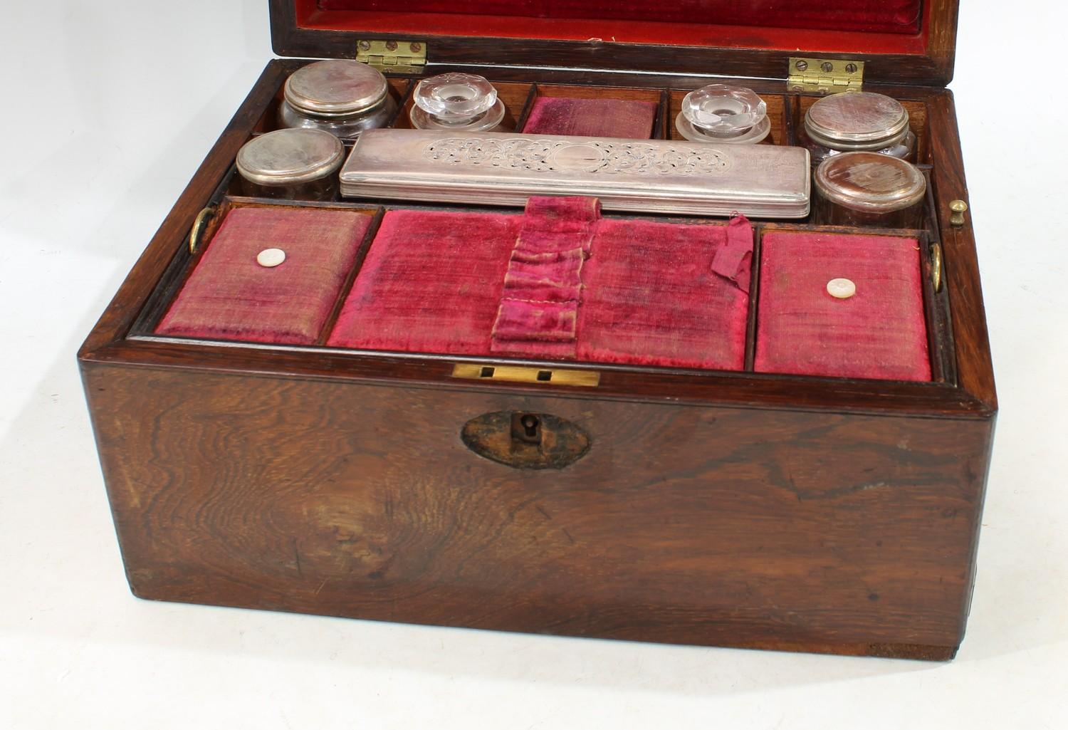 A Victorian mahogany work box, fitted with unmarked white metal topped dressing table jars, red - Image 3 of 4