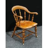 A country house elm windsor chair, saddle seat, turned legs, 86cm high