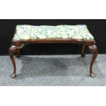 A George II style mahogany stool, drop in seat, cabriole legs, 44.5cm high, 95cm wide.