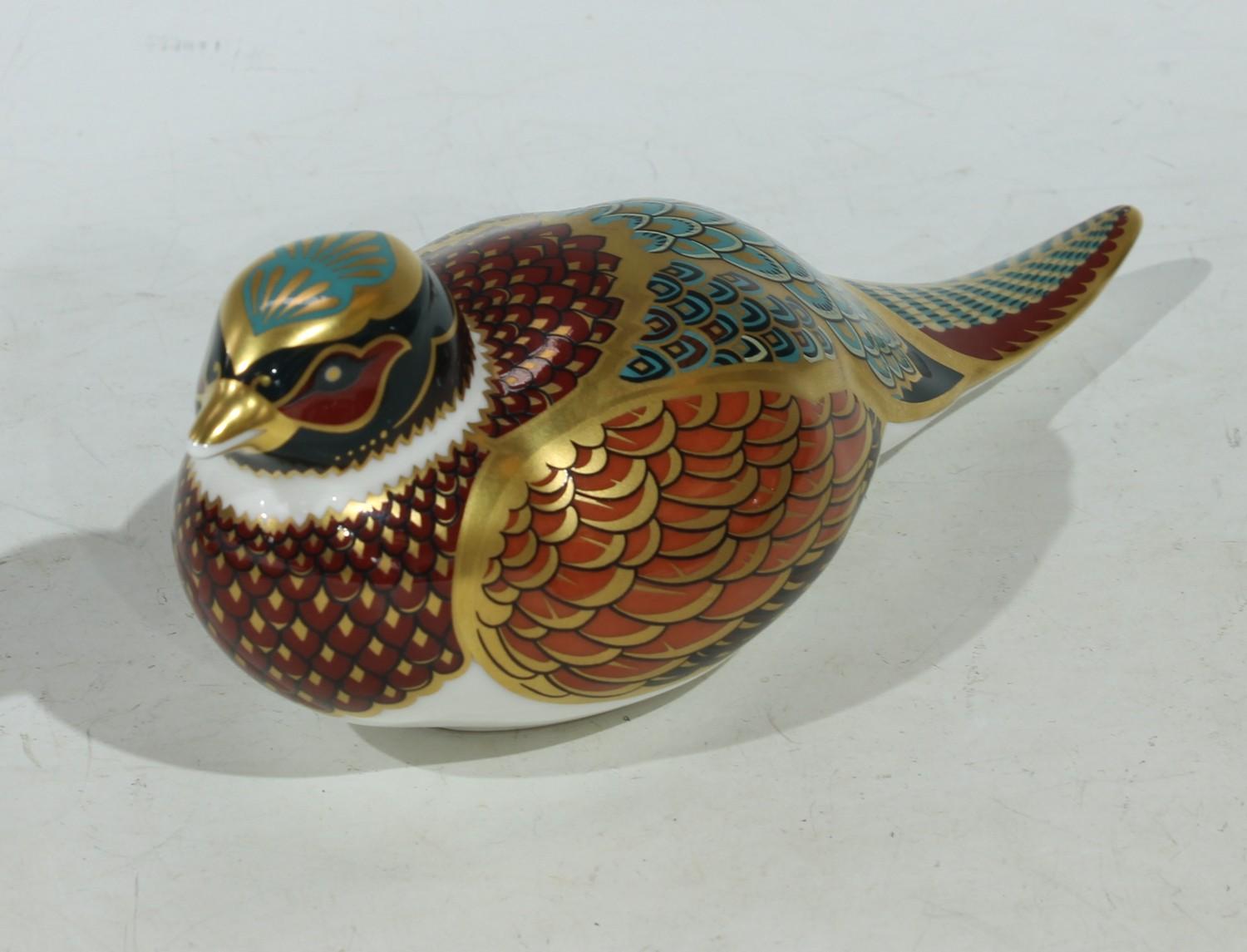 A Royal Crown Derby paperweight, Woodland Pheasant, Collectors Guild Exclusive, gold stopper