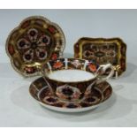 A Royal Crown Derby 1128 Imari pattern teacup and saucer; Royal Crown Derby 1128 Imari pattern pin