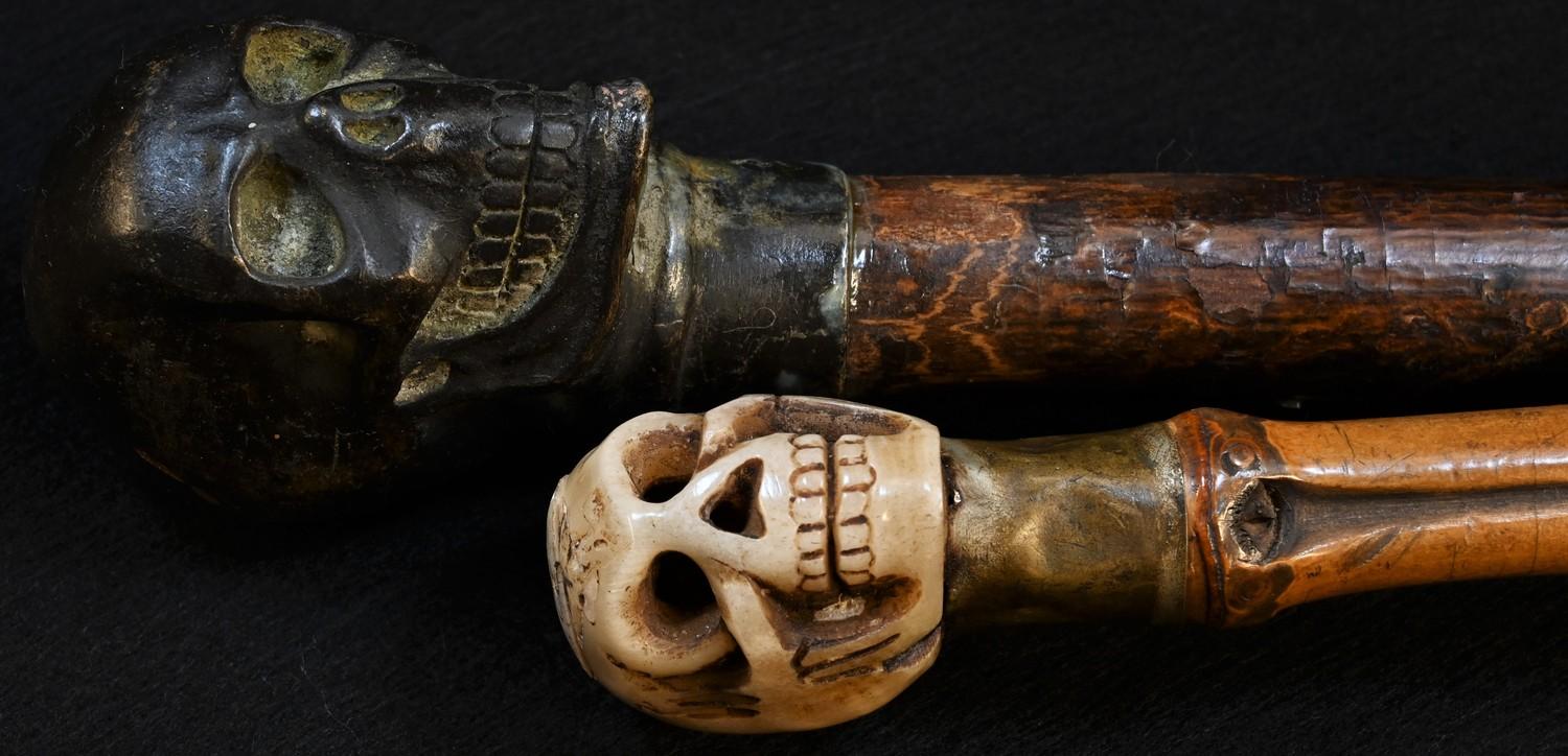 A bronze mounted momento mori walking stick, the pommel cast as a skull, 90cm long; another, similar - Bild 2 aus 2