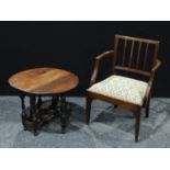 An early 20th century oak arm chair, drop in seats, tapered square legs; an oak gateleg table,