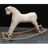 A 1960's/70's corduroy rocking horse, 76cm high