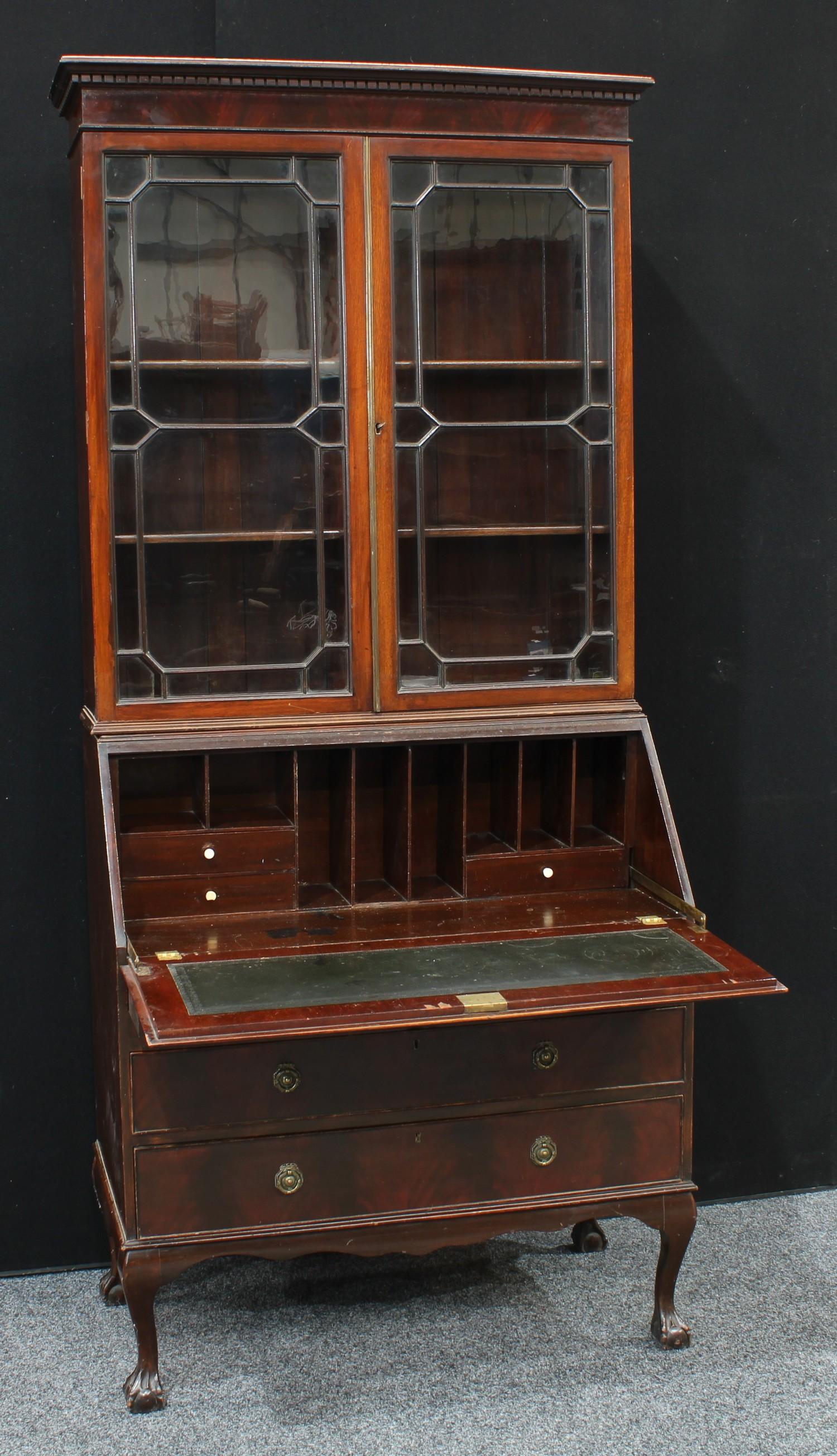 A 'Geroge III' mahogany bureau bookcase, dentail cornice above a pair of glazed doors enclosing - Image 2 of 2