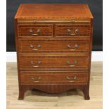 A George III style mahogany bachelor's chest, flush top above a slide and two short and three long