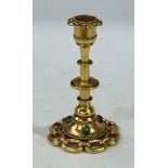 A gilt brass candlestick, set with three polished oval malachite cabochons, 13cm
