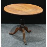 A George III oak tripod supper table, circular top, cabriole legs, pad feet, 75.5cm high, 90cm