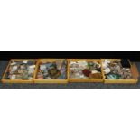 Geology - a collection of polished stones and specimens in four rectangular wooden trays, mostly