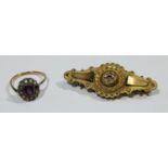 A Victorian 9ct gold navette shaped brooch; a 9ct gold cluster ring (2)