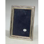 An Italian silver rectangular easel photograph frame, 21.5cm high