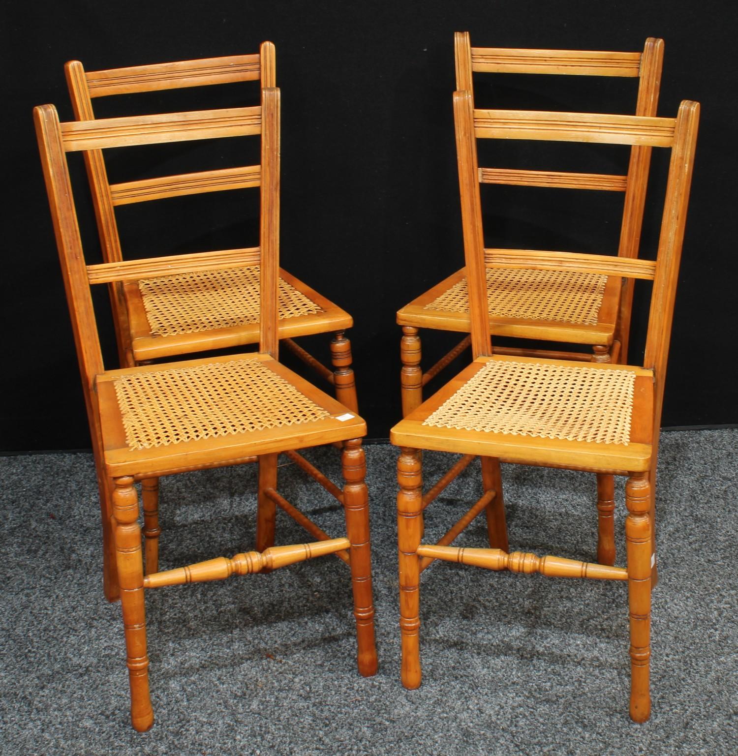 A set of four farmhouse kitchen chairs, cane topped,(4)