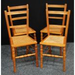 A set of four farmhouse kitchen chairs, cane topped,(4)