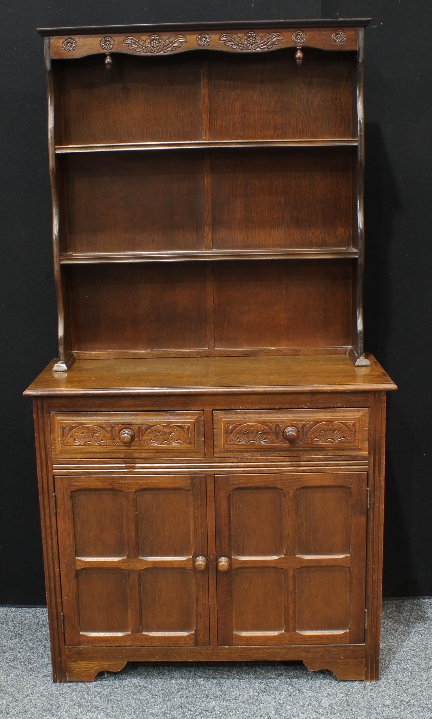 An oak dresser, two drawers over two panelled cupboard doors to base, 178cm high, 94cm wide; a - Bild 3 aus 3