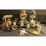 A Tilley lamp, spares and dip-stick; a Swedish Primus stove; cycle lamps; two blow torches; lantern;