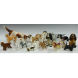 A collection of model dogs, comprising a Beswick wire haired terrier Talaverus Romulus; a Beswick