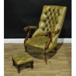 A Chesterfield type open arm chair, button back, reeded arms, turned legs; similar foot stool.(2)