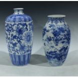 A Chinese slender ovoid vase, transfer printed in blue and white with a continuous garden landscape,