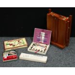 Artist's Materials - a portable easle compendium; a Chinese brush set, cased; a Calligraphy set,