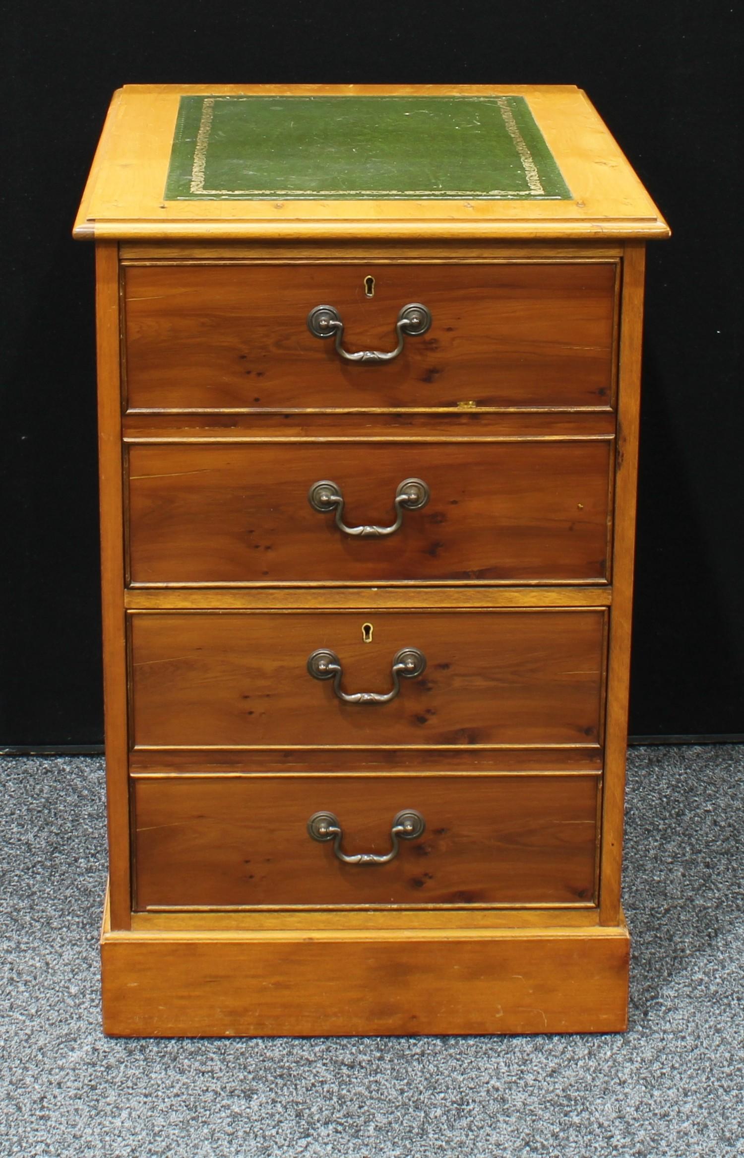 A yew wood filing cabinet, 79cm high. 51cm wide, 64cm deep.