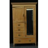 A country house pine wardrobe, outswept cornice, mirror door. 205.5cm high