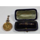 A French 14k gold lady's open face pocket watch, 22.9g altogether; a 9ct gold bar brooch, steel pin,