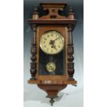 A 20th century mahogany vienna wall clock, 59cm long.