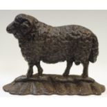 An late 19th/early 20th century cast iron doorstop in the form of a sheep