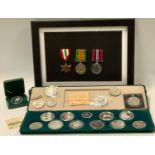 Coins & medals - a WWII trio of medals including War medal, The Defense medal and The Italy Star,