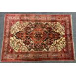 A Persian hand-made Nahavand rug 230cm x 158cm