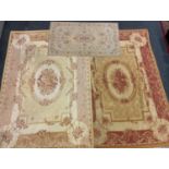 A large Laura Ashley Aubusson rug, approx 240cm x 164cm; others (3)