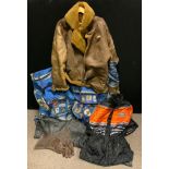 A 20th century leather and sheepskin flying jacket, some rips; two 1960 canvas rucksacks, with