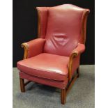 An office leatherette wing back armchair